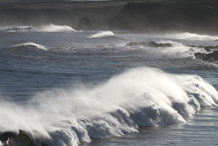 ...or that of waves crashing on shore. (Image courtesy of Wikipedia.)